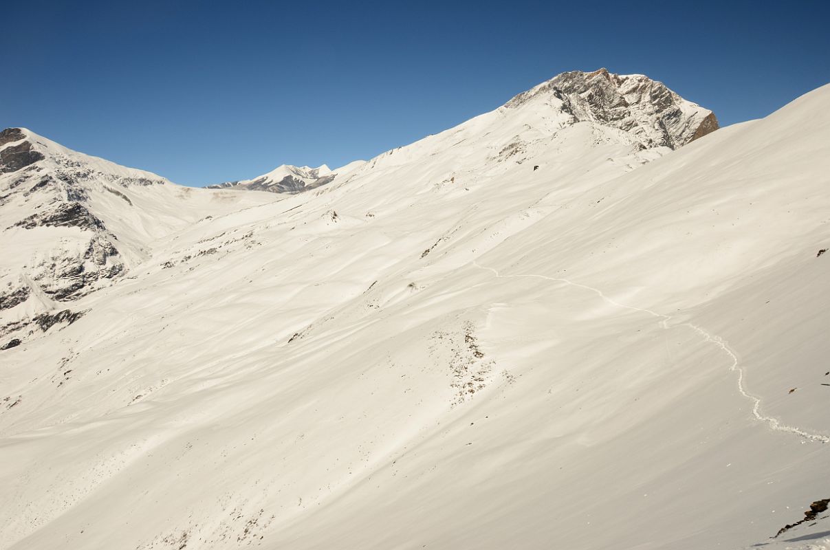 09 Trail Continues On Snow From The Top Of The Ridge Above Yak Kharka Towards Kalopani Around Dhaulagiri 